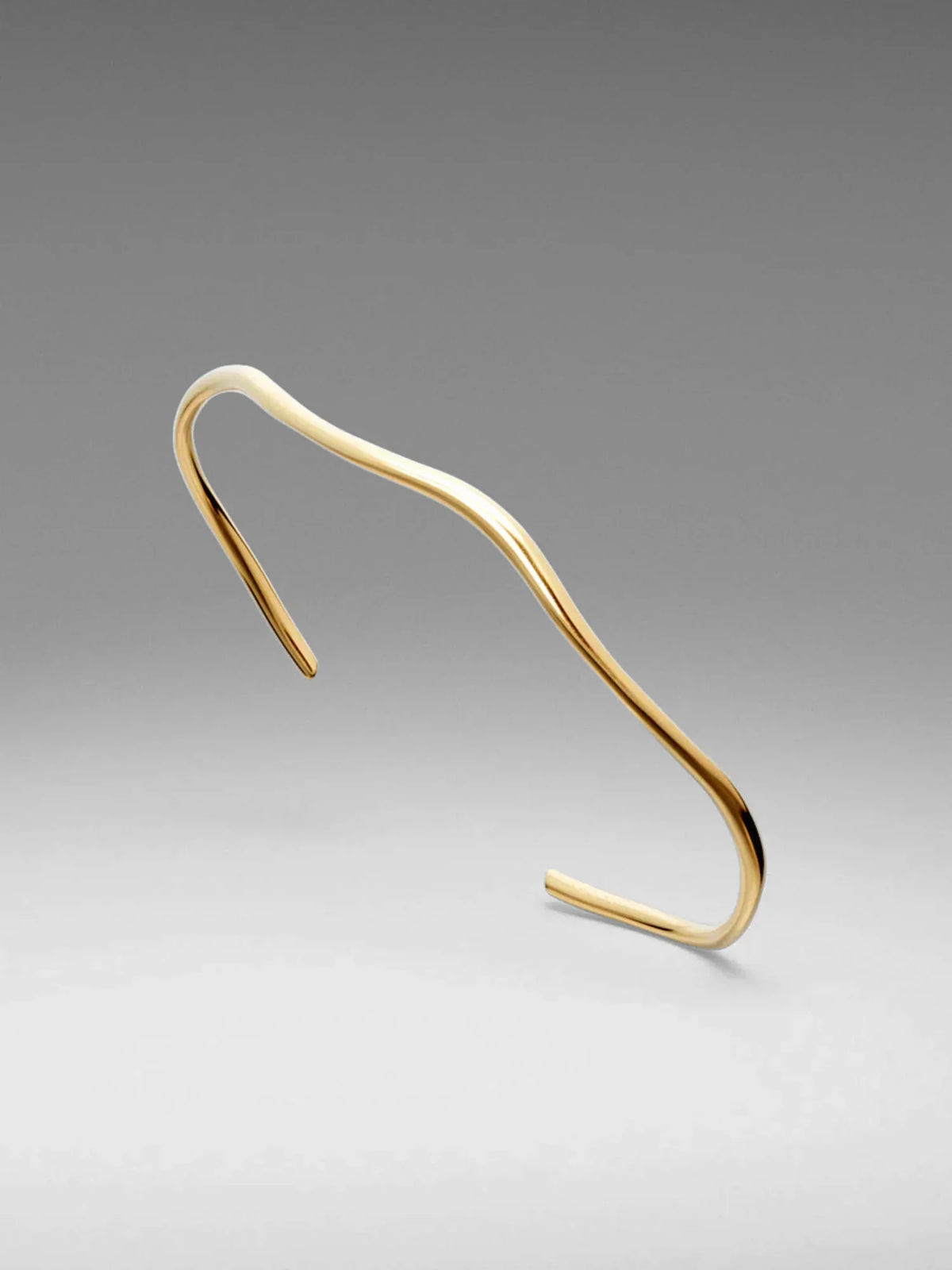 VL. Adjustable Gold Fluid Cuff